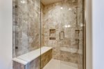 The master bath has a large, walk in shower